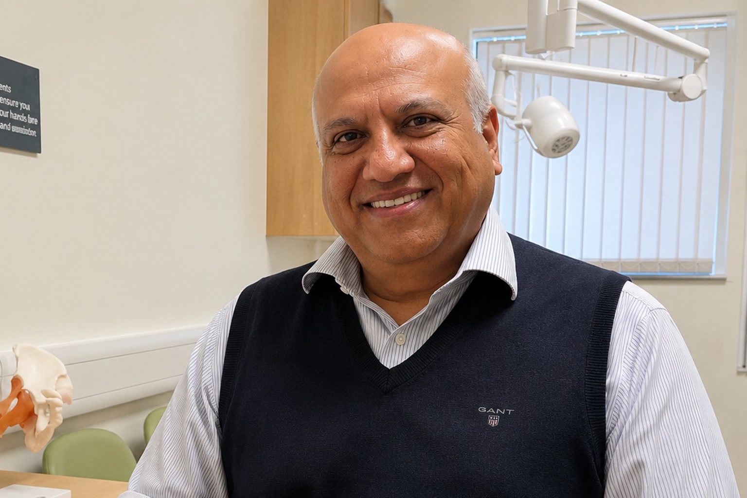 Mr Arpit Patel in a private orthopaedic consulting room.
